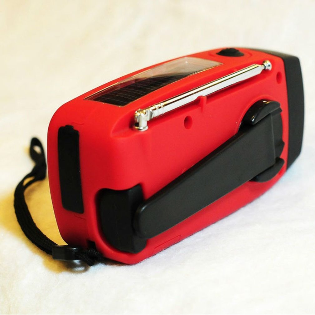 Solar hand crank USB charging radio flashlight